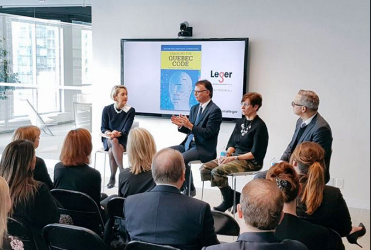 group of people listening to a conference