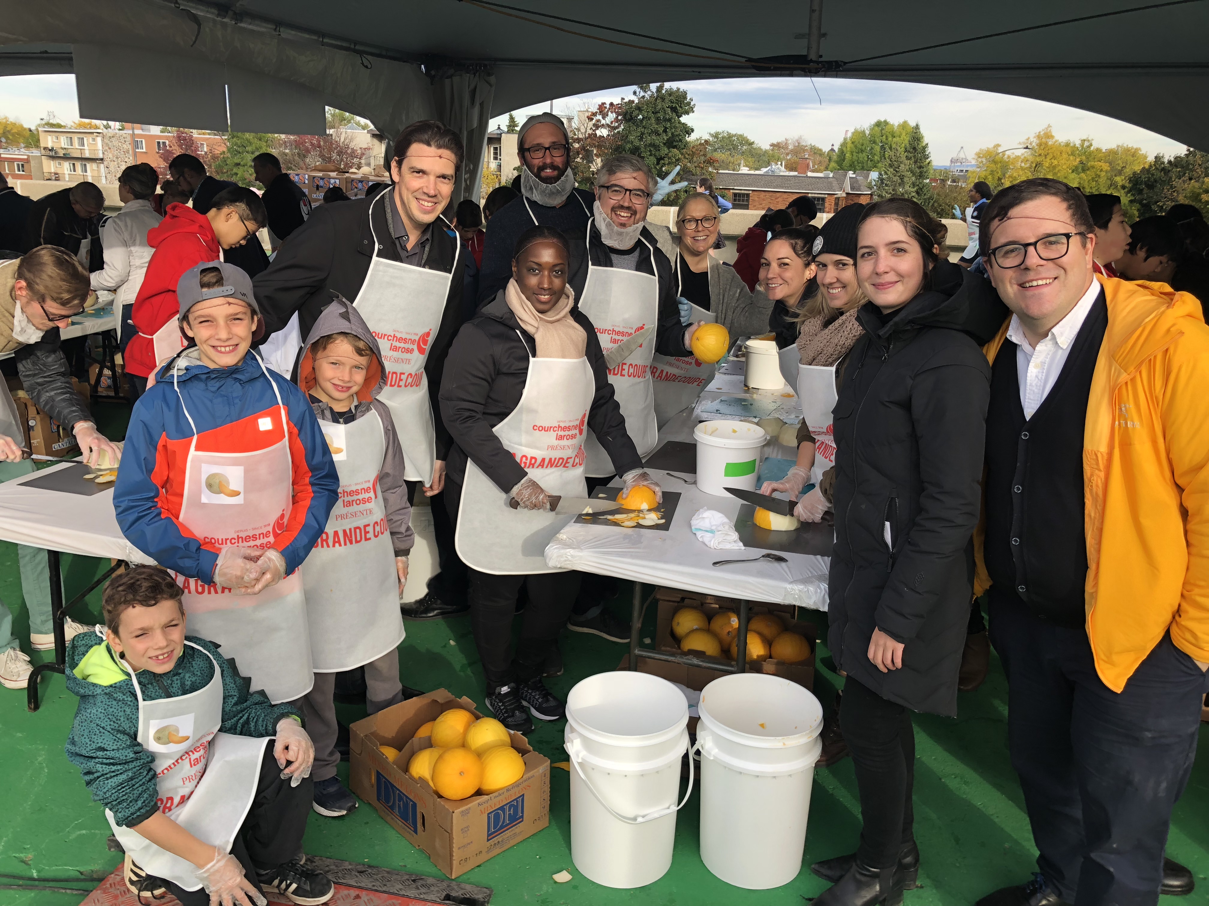 NATIONAL employees cutting fruits for the world's largest fruit salad